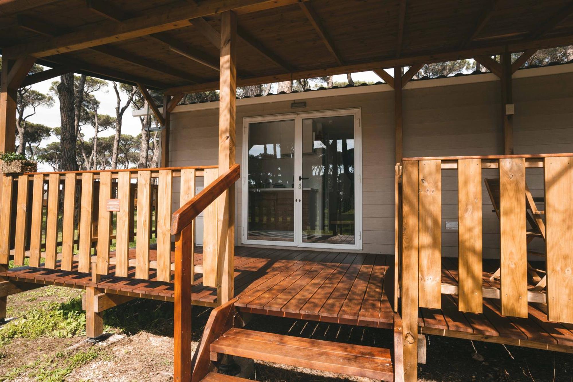 Isola Verde Camping Village Нетуно Стая снимка